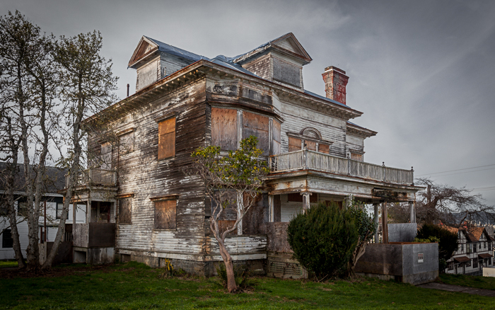 The historical George Conrad Flavel House in Astoria, Oregon, abandoned following the departure of Harry and Mary Louise Flavel.